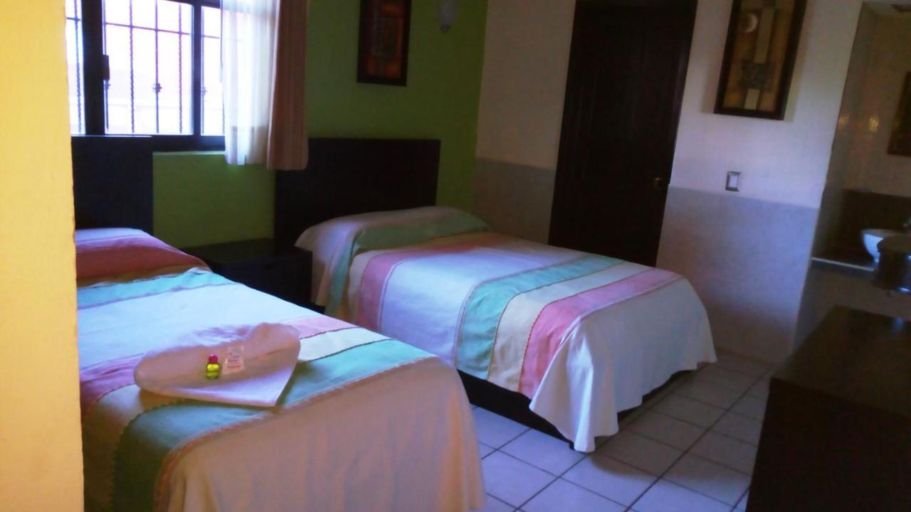 Hotel Real Plaza Окосинго Экстерьер фото
